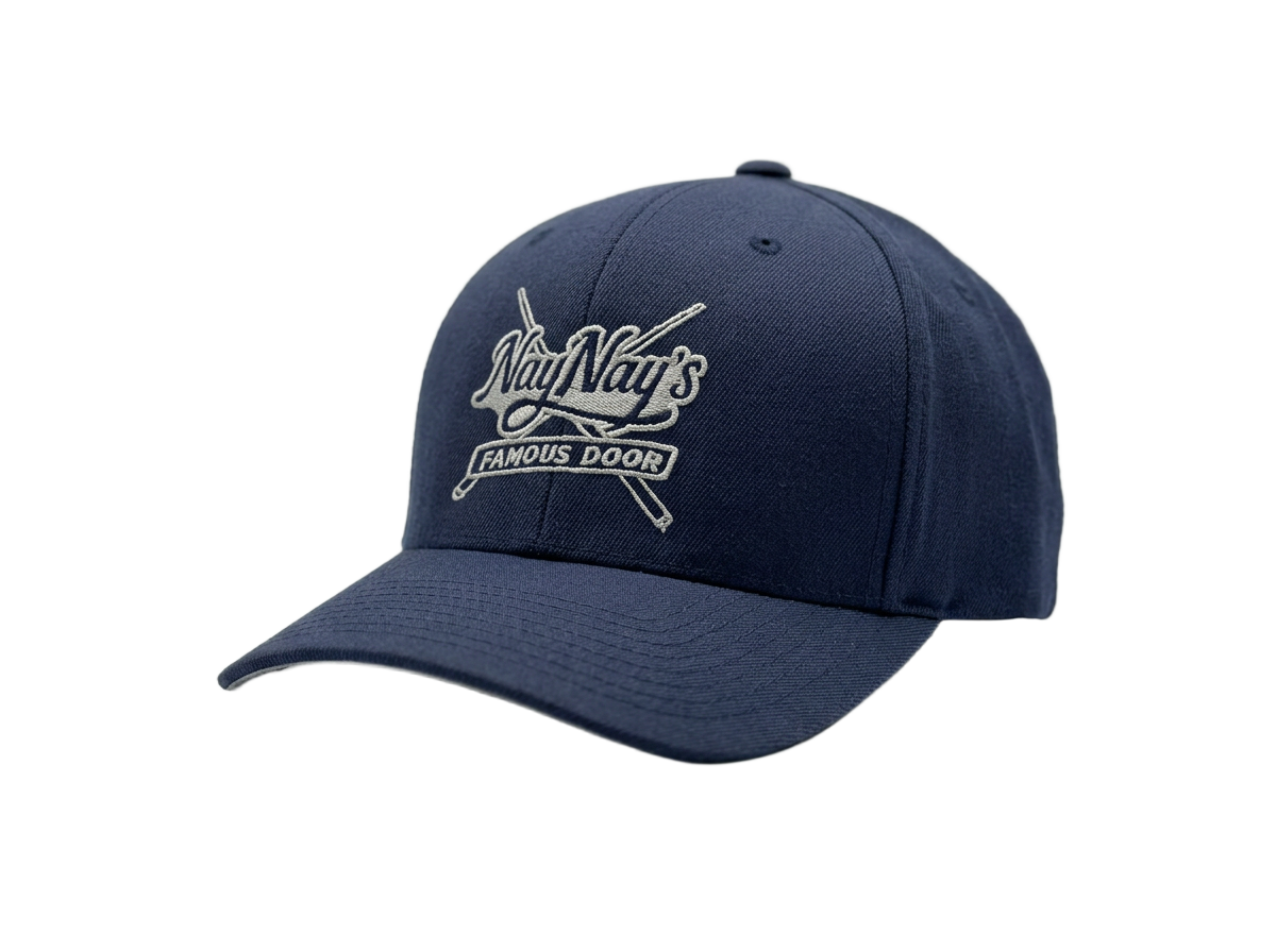 Navy blue Flexfit baseball cap with silver NayNay's Famous Door embroidered logo